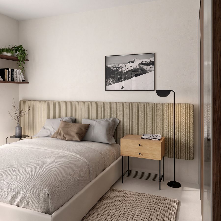 Quarto com cabeceira listrada, criado-mudo de madeira e luminária de piso preta